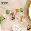 New light luxury geometric hook, moisture-proof, waterproof, no need for drilling, no trace, strong load-bearing, bathroom door, bedroom door, rear adhesive hook Application Scenario